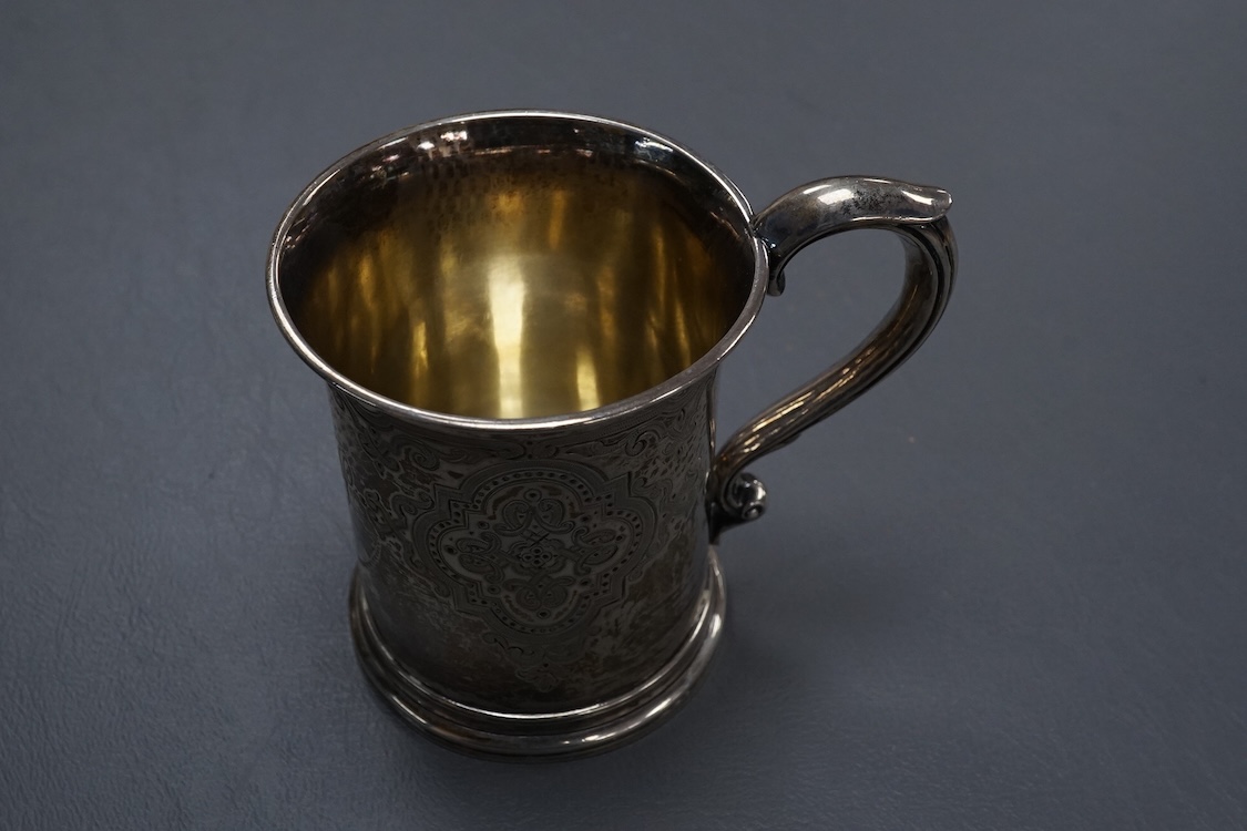 A Victorian engraved silver christening mug, Edward Ker Reid, London, 1871, height 85mm, 133 grams.